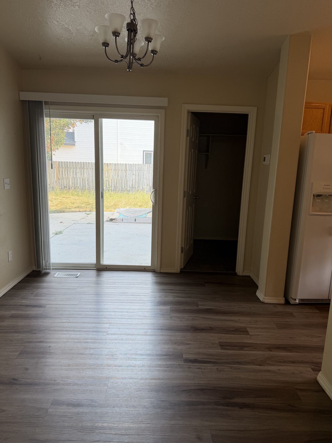 A finished apartment living and dining room, cleaned and ready for move-in